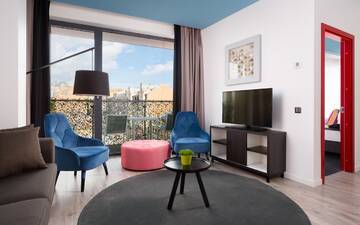 Фото номера Апартаменты с 1 спальней и балконом Апарт-отели Park Inn by Radisson Residence Riga Barona г. Рига 4