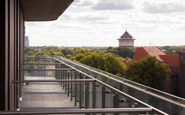Фото номера Стандартный номер с балконом Отель Park Inn by Radisson Riga Valdemara г. Рига 3