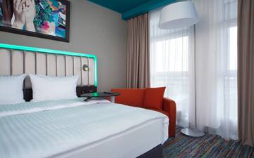 Фото номера Стандартный номер с видом на Старый город Отель Park Inn by Radisson Riga Valdemara г. Рига 4