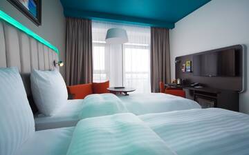 Фото номера Стандартный номер с балконом Отель Park Inn by Radisson Riga Valdemara г. Рига 5