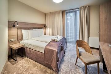 Фото номера Стандартный одноместный номер Отель Wellton Riverside SPA Hotel г. Рига 2