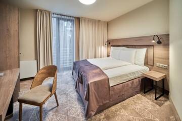 Фото номера Стандартный одноместный номер Отель Wellton Riverside SPA Hotel г. Рига 3