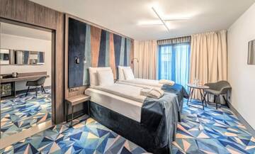 Фото номера Семейный номер Отель Wellton Riverside SPA Hotel г. Рига 2