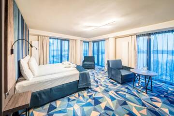 Фото номера Номер Делюкс с видом на реку Отель Wellton Riverside SPA Hotel г. Рига 2