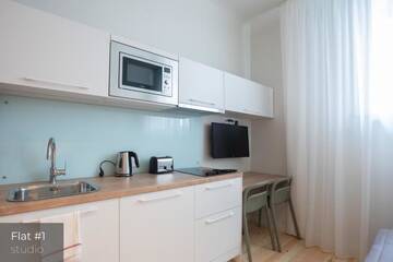Фото номера Апартаменты - 1-й этаж Апартаменты Dandelion Apartments Stabu г. Рига 15