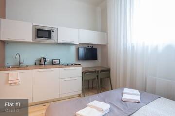 Фото Апартаменты Dandelion Apartments Stabu г. Рига 2