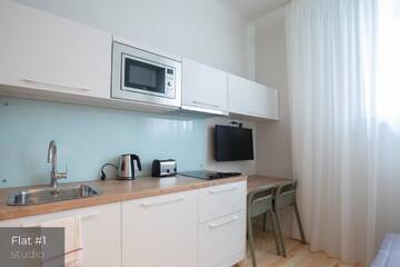 Фото номера Апартаменты - 1-й этаж Апартаменты Dandelion Apartments Stabu г. Рига 4