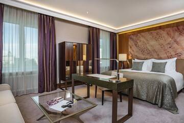 Фото номера Двухместный номер Делюкс с 1 кроватью Отель Grand Hotel Kempinski Riga г. Рига 2