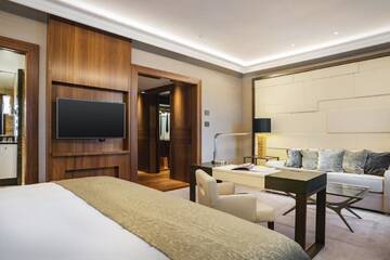 Фото номера Двухместный номер Делюкс с 1 кроватью Отель Grand Hotel Kempinski Riga г. Рига 4