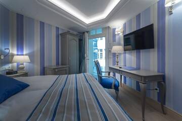 Фото номера Небольшой двухместный номер с 1 кроватью Отель Relais Le Chevalier г. Рига 4