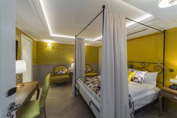 Фото номера Улучшенный двухместный номер с 1 кроватью Отель Relais Le Chevalier г. Рига 3