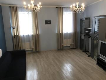 Фото Апартаменты Riverside Promenade Apartment г. Рига 1