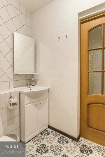 Фото номера Апартаменты с 2 спальнями и террасой Апартаменты Dandelion Apartments Lāčplēša г. Рига 25