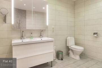 Фото номера Апартаменты с 5 спальнями и балконом Апартаменты Dandelion Apartments Lāčplēša г. Рига 14