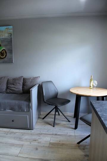 Фото номера Большой двухместный номер с 1 кроватью Апартаменты Loft design studio apartment г. Рига 17