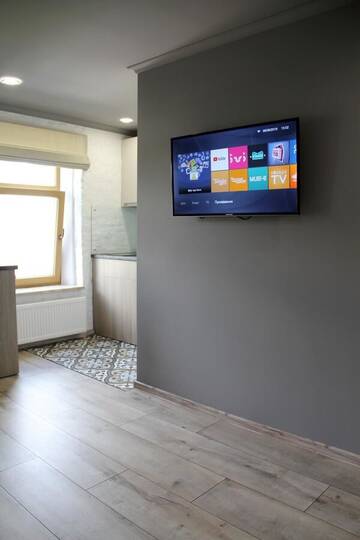 Фото номера Большой двухместный номер с 1 кроватью Апартаменты Loft design studio apartment г. Рига 14