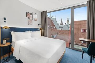 Фото номера Номер с кроватью размера «king-size» Отель Hilton Garden Inn Riga Old Town г. Рига 8