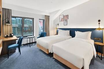 Фото номера Двухместный номер с 2 отдельными кроватями Отель Hilton Garden Inn Riga Old Town г. Рига 3