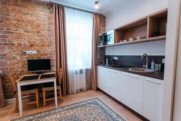 Фото номера Апартаменты Делюкс Апартаменты Pērnavas XV studio loft г. Рига 25