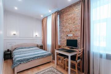 Фото номера Апартаменты Делюкс Апартаменты Pērnavas XV studio loft г. Рига 30