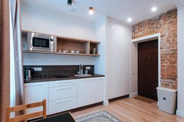 Фото номера Апартаменты Делюкс Апартаменты Pērnavas XV studio loft г. Рига 7
