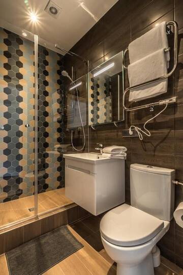 Фото номера Улучшенные апартаменты Апартаменты Greystone Suites &amp; Apartments г. Рига 11