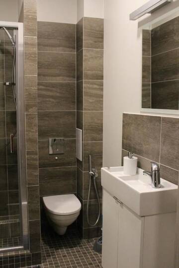 Фото номера Апартаменты с 3 спальнями Апартаменты Old City Cinema Loft Delux г. Рига 15
