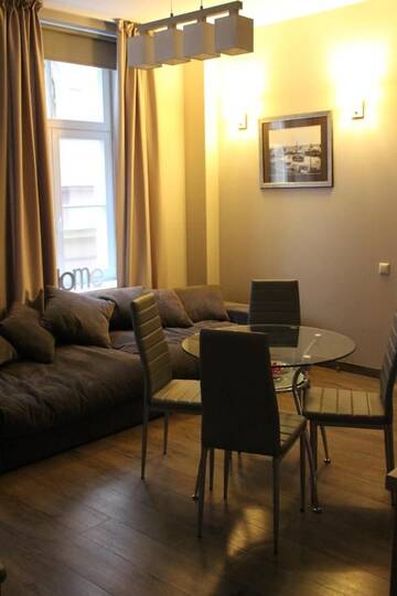 Фото номера Апартаменты с 3 спальнями Апартаменты Old City Cinema Loft Delux г. Рига 10