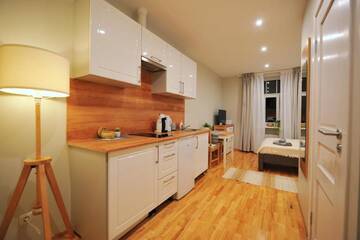 Фото номера Улучшенный номер-студио Апартаменты Hanzas residence г. Рига 3