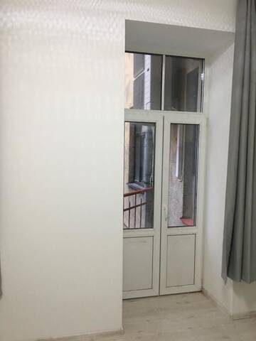 Фото номера Номер с кроватью размера «queen-size» и балконом Мини-отель Smart Inn г. Рига 6