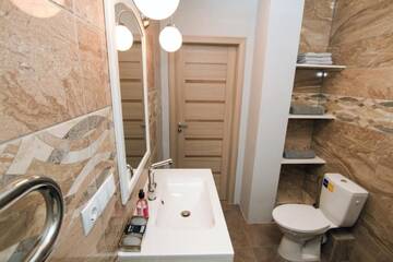 Фото номера Апартаменты с 3 спальнями Апарт-отели Skyline Apartments г. Рига 28