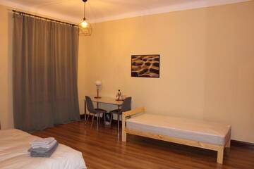 Фото номера Апартаменты с 3 спальнями Апарт-отели Skyline Apartments г. Рига 33