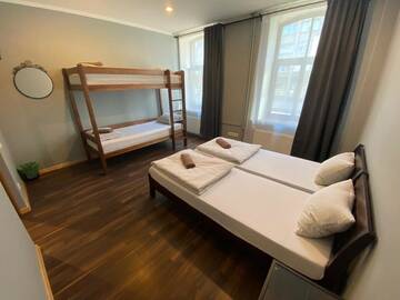 Фото номера Семейный номер с общей ванной комнатой Отель Mini Hotel г. Рига 6