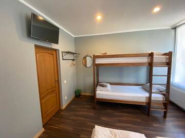 Фото номера Семейный номер с общей ванной комнатой Отель Mini Hotel г. Рига 7