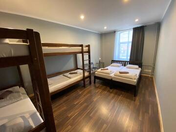 Фото номера Семейный номер с общей ванной комнатой Отель Mini Hotel г. Рига 11