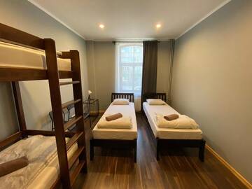 Фото номера Семейный номер с общей ванной комнатой Отель Mini Hotel г. Рига 7