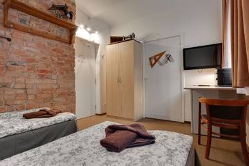Фото номера Двухместный номер с 2 отдельными кроватями Отель Janne Hotel г. Рига 3