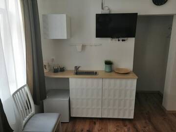 Фото номера Улучшенный двухместный номер с 2 отдельными кроватями Отель PaPa Home г. Рига 3