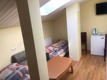 Фото номера Двухместный номер с 2 отдельными кроватями - Мансарда Отель Hotel Sabina г. Рига 5