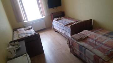 Фото номера Трехместный номер Отель Hotel Sabina г. Рига 2