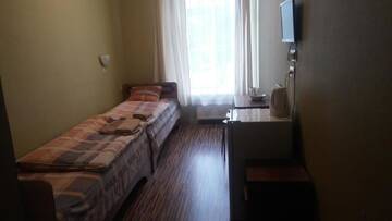 Фото номера Двухместный номер с 2 отдельными кроватями Отель Hotel Sabina г. Рига 4