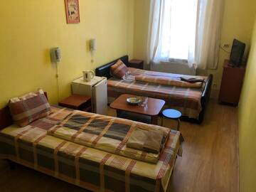 Фото номера Двухместный номер с 2 отдельными кроватями Отель Hotel Sabina г. Рига 7