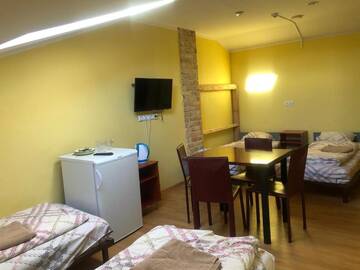 Фото номера Четырехместный номер в мансарде Отель Hotel Sabina г. Рига 3