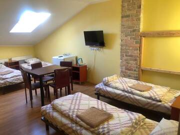 Фото номера Четырехместный номер в мансарде Отель Hotel Sabina г. Рига 5