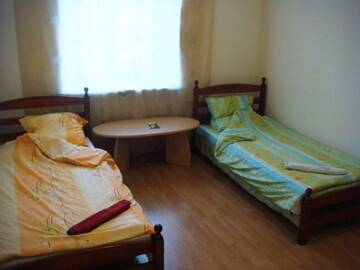Фото номера Двухместный номер с 2 отдельными кроватями и общей ванной комнатой Апарт-отели Cheap &amp; Good Apartments г. Рига 4