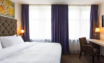 Фото номера Двухместный номер с 1 кроватью или 2 отдельными кроватями Отель Radisson Hotel Old Town Riga г. Рига 2