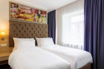 Фото номера Двухместный номер с 1 кроватью или 2 отдельными кроватями Отель Radisson Hotel Old Town Riga г. Рига 3