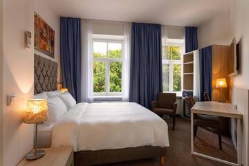 Фото номера Стандартный номер с видом на парк Отель Radisson Hotel Old Town Riga г. Рига 2