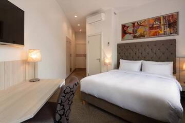 Фото номера Стандартный номер с видом на парк Отель Radisson Hotel Old Town Riga г. Рига 3