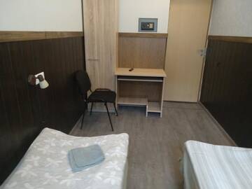 Фото номера Бюджетный двухместный номер с 2 отдельными кроватями Отель Atrium г. Рига 2